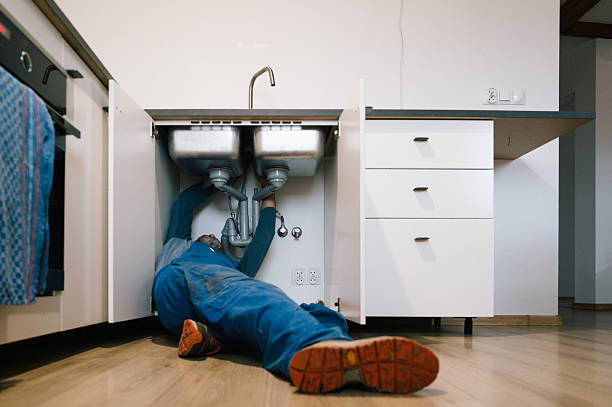 Professional Drain Cleaning technician working in Poneto, IN